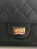Placage or sur un sac Chanel du luxe vintage qui augmente la valeur du sac