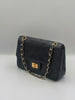Sac chanel vintage classique timeless cuir noir avec fermoir mademoiselle des années 70's