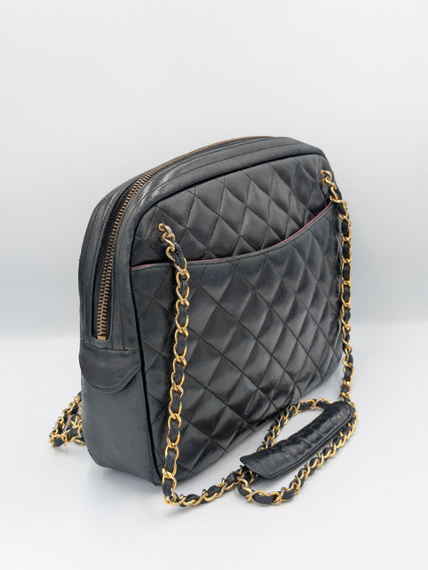 Sac Chanel camera bag vintage en cuir noir matelassé et placage or 24 carats