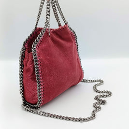Falabella Tiny rose pailletée détail chaîne signature Stella McCartney