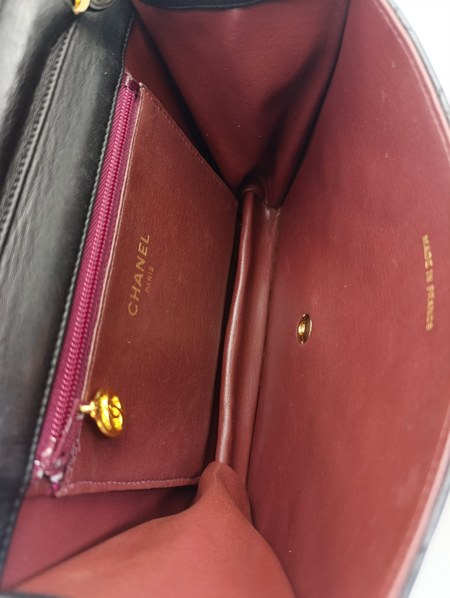 Sac Chanel Timeless 22 cuir noir détail matelassage losanges