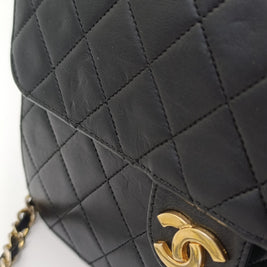 Chanel Timeless 22 cuir noir détail coins du sac