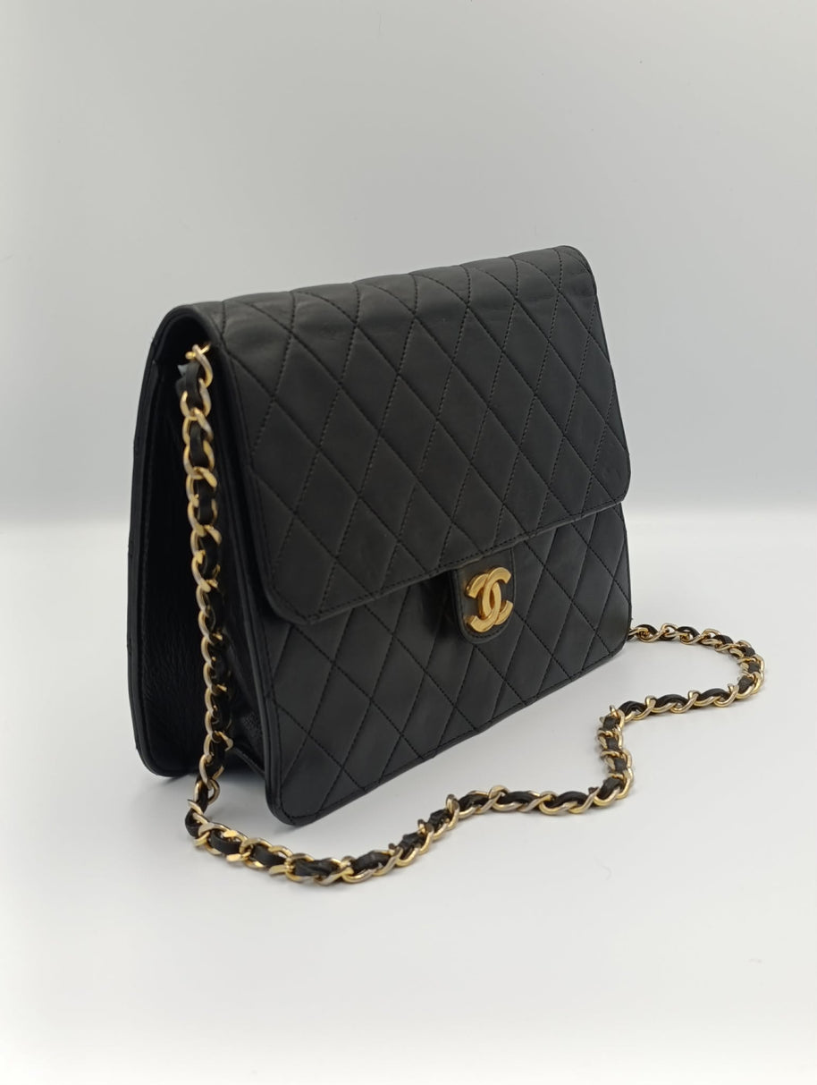 Sac Chanel Timeless 22 noir détail chaîne entrelacée cuir