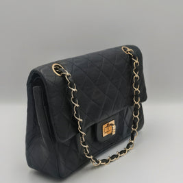 Sac Chanel 2.55 cuir noir et dorure 24k Gold- Génération 70's