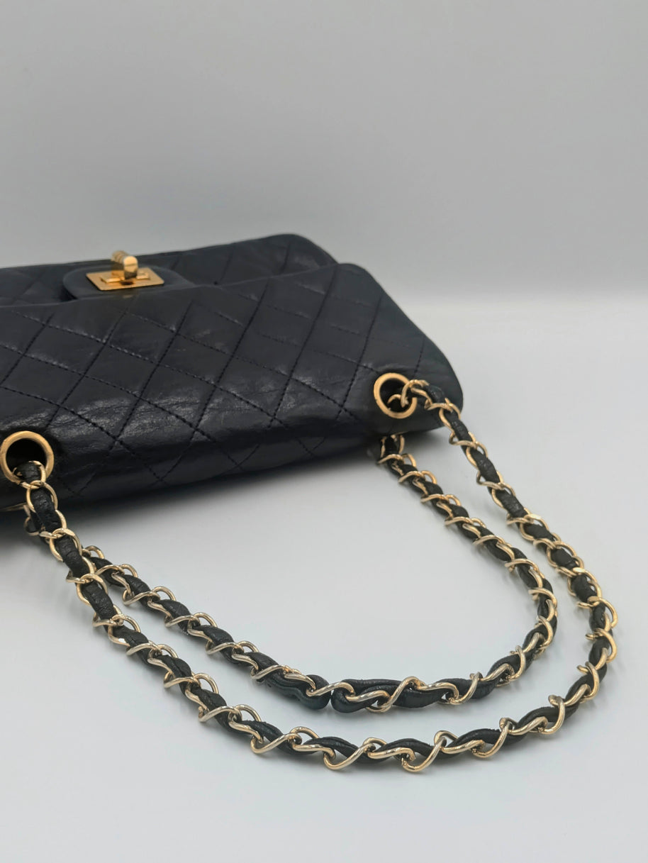 Sac Chanel 2.55 cuir noir et dorure 24k Gold- Génération 70's