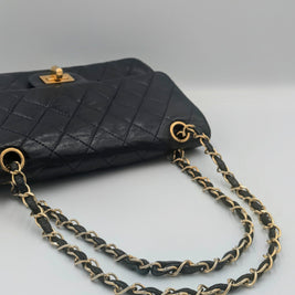 Sac Chanel 2.55 cuir noir et dorure 24k Gold- Génération 70's