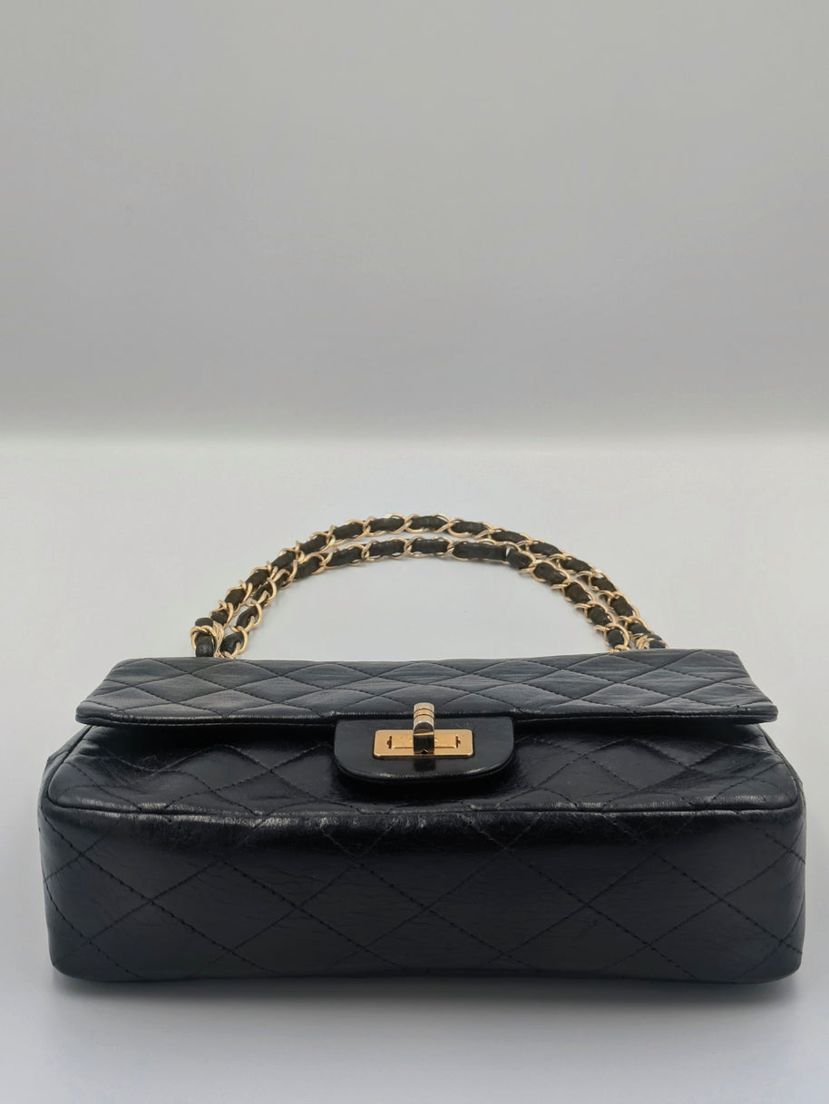 Sac Chanel 2.55 cuir noir et dorure 24k Gold- Génération 70's