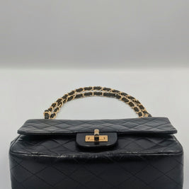 Sac Chanel 2.55 cuir noir et dorure 24k Gold- Génération 70's