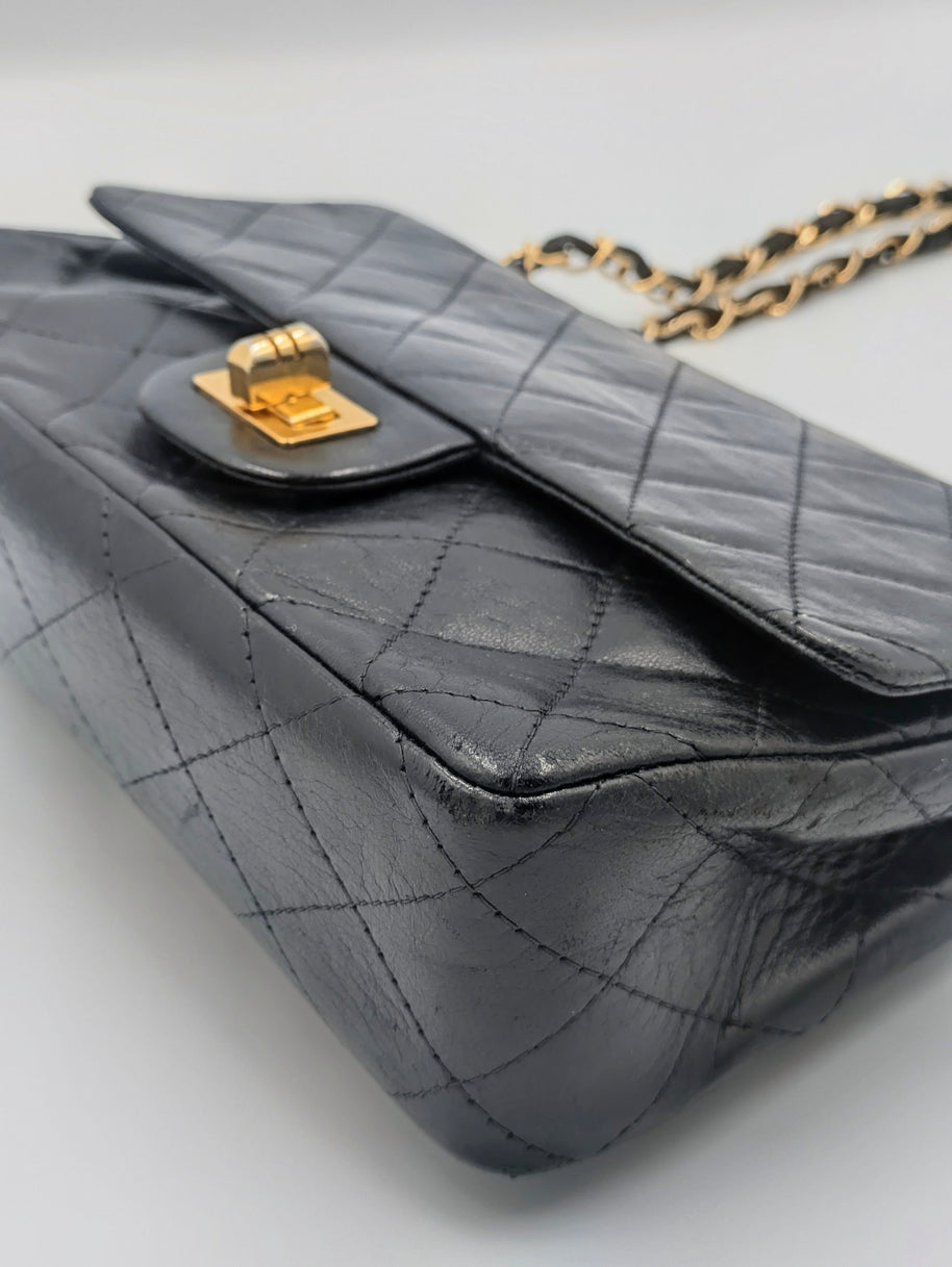Sac Chanel 2.55 cuir noir et dorure 24k Gold- Génération 70's
