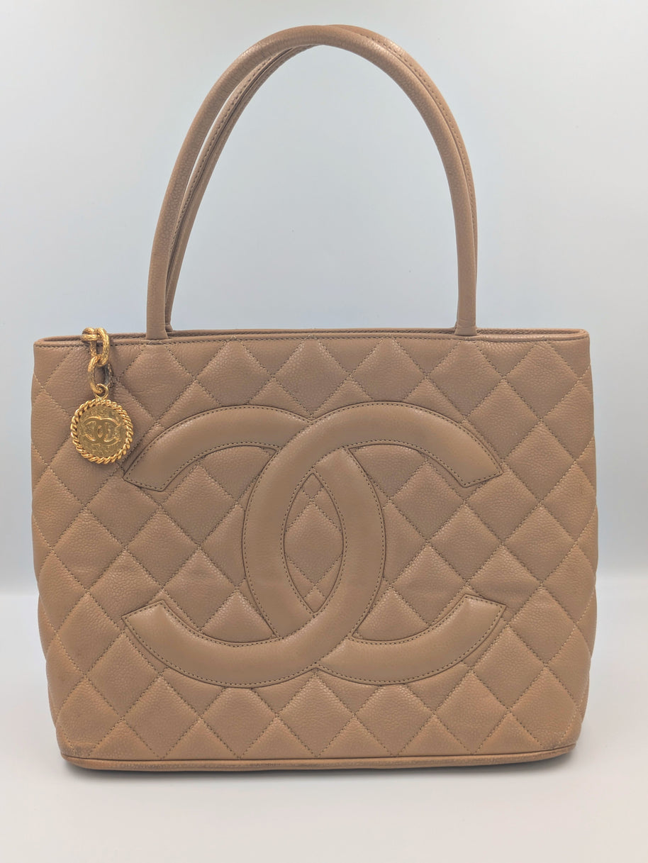 Chanel Médaillon camel intérieur du sac
