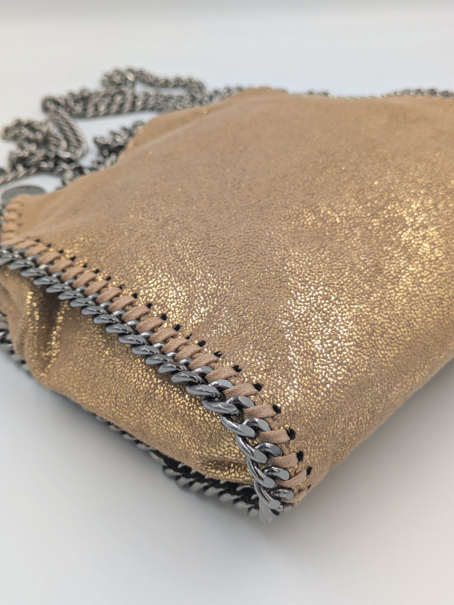 Falabella Tiny doré étiquette et numéro de série