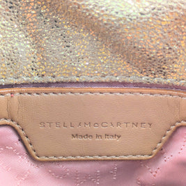 Falabella Tiny doré pailleté vue d'ensemble sac posé