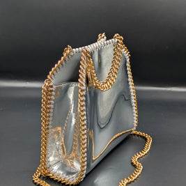 Sac Stella McCartney x Sorayama Falabella tiny argenté de profil, chaîne dorée