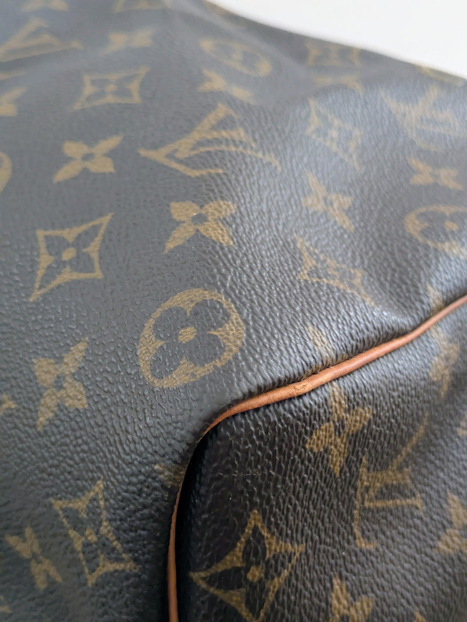 Keepall 50 Bandoulière dust bag et accessoires