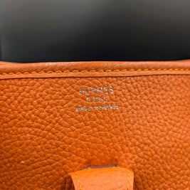 Sac Hermès Evelyne 29 orange marquages Hermès